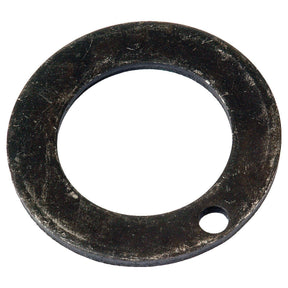 A black metal thrust washer, with a large central hole and a small secondary hole near the edge, typically used in the front axle of Allis Chalmers machinery, is available as the Thrust Washer under Sparex Part No. S.59023 by Sparex.