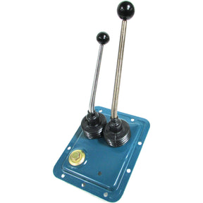 The Top Cover Assembly (Sparex Part No. S.66211) consists of two metal levers with black knobs mounted on a blue metal base plate and is accompanied by a bolt. This component, compatible with Ford / New Holland machines, is sourced through Sparex.