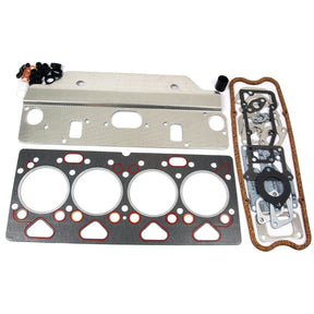 A collection of engine gaskets and seals displayed on a white surface, featuring the Sparex Top Gasket Set - 4 Cyl. (4.285, 4.236, 4.212, 4.248) | Sparex Part No.S.41955, which includes a multi-layer steel head gasket and valve seals for Perkins engines among various other shaped gaskets.
