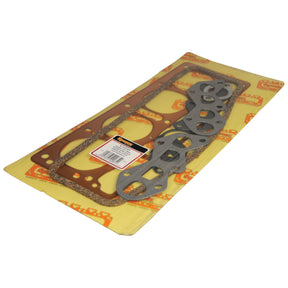 A Sparex Top Gasket Set - 4 Cyl. (TEA20 Petrol, 85mm) with Sparex Part No. S.42085 for Massey Ferguson 135, displayed on a yellow backing with a labeled sticker.