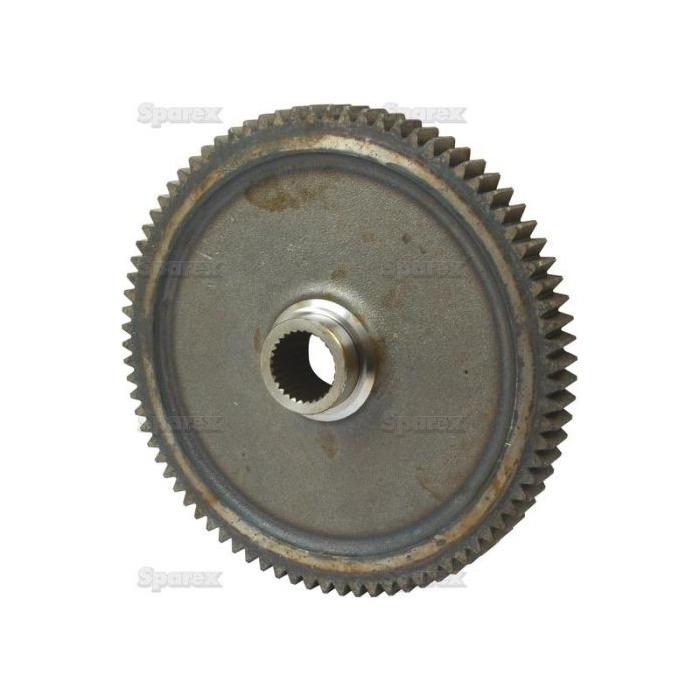 The Transmission Gear PTO - S.65350 from Sparex is a circular, metal gear featuring a central hole and evenly spaced teeth splines around the edge, slightly worn with some rust. It is ideal for use as part of your Sparex components.