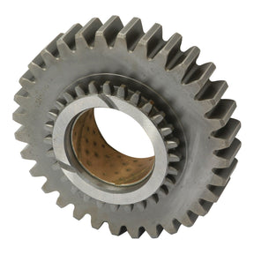 A close-up image of the Transmission Gear Reverse (Sparex Part No. S.65340) with interlocking teeth and a central hollow cylindrical opening, designed specifically for Ford New Holland machinery by Sparex.