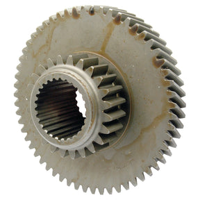 Close-up of a Transmission Gear with interlocking teeth, showing some wear and oil stains, typical of Sparex Part No.S.60688 for Ford New Holland tractor parts.