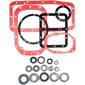 An assortment of the Sparex Transmission Repair Kit (Sparex Part No.S.66962), including gaskets, bearings, and seals arranged on a white background. The kit features various sizes and shapes such as round and rectangular gaskets and multiple ball bearings.