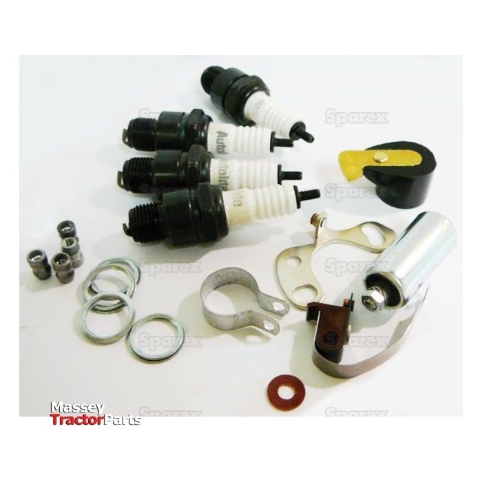 A collection of Sparex Ignition Kit - S.42733 tractor engine parts, including spark plugs, washers, screws, a condenser, and various metal brackets, displayed against a white background.