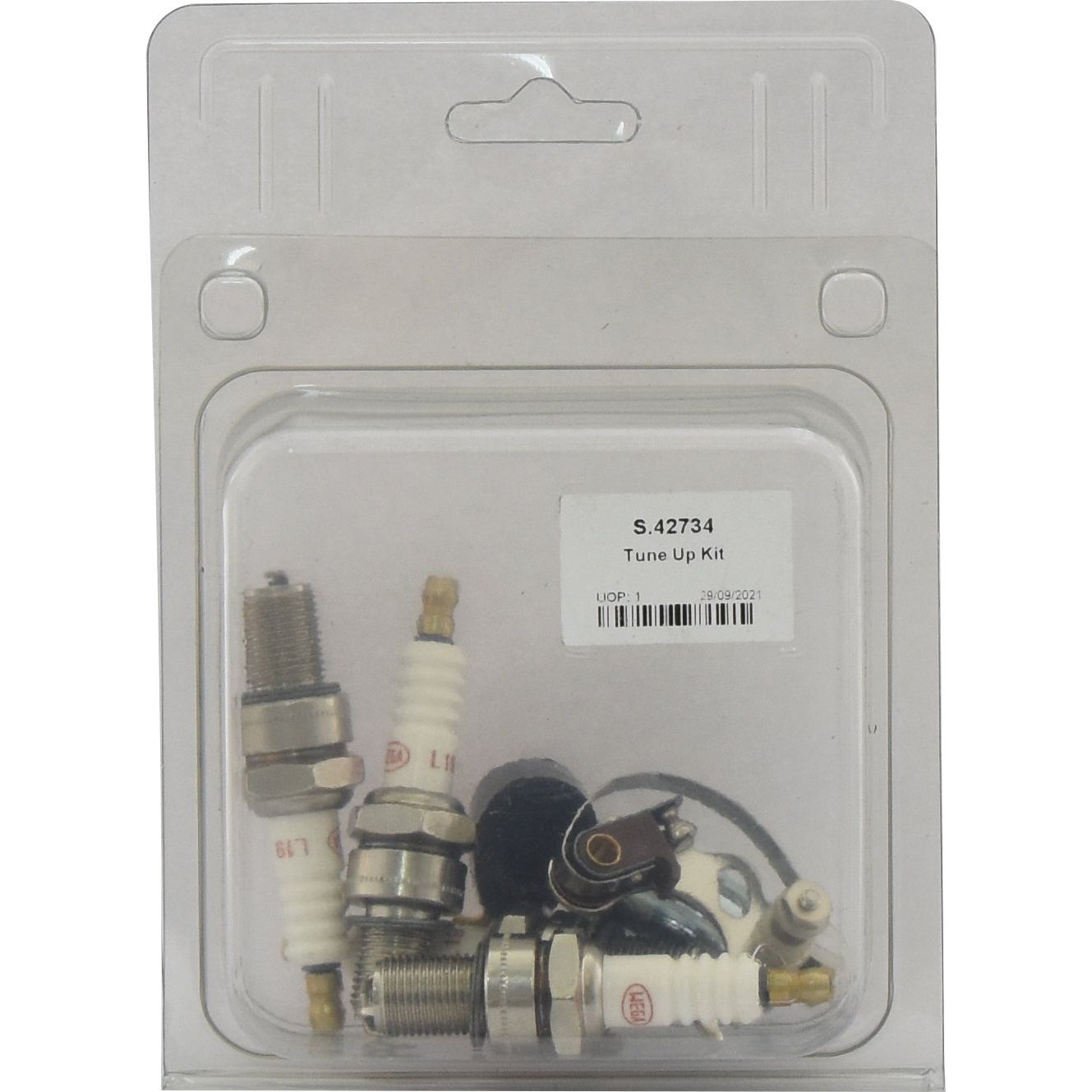 A packaged automobile ignition kit containing spark plugs and other components. The label reads "Ignition Kit - S.42734," compatible with related products from Sparex.
