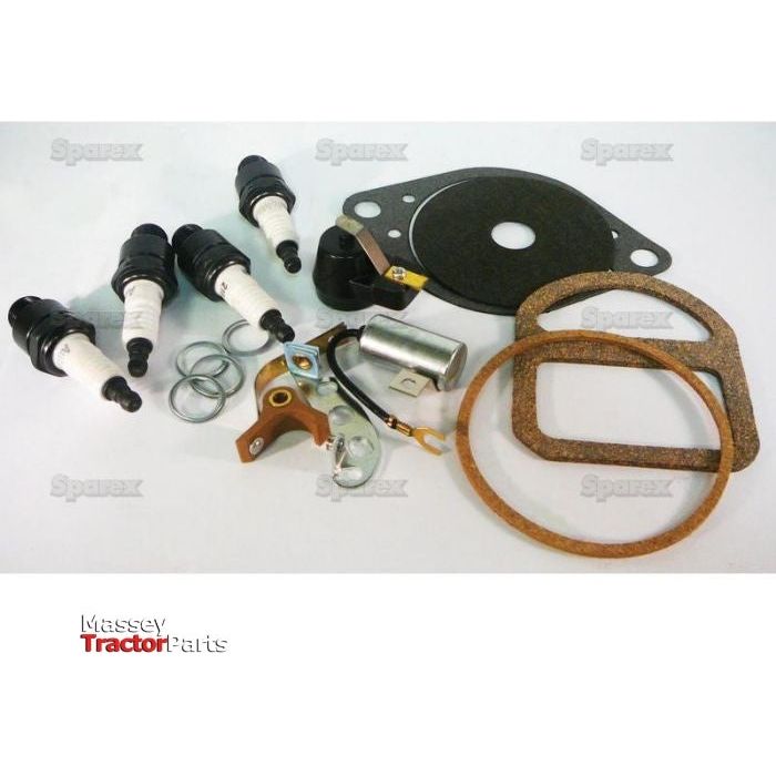 A set of tractor engine parts, including the Ignition Kit (Sparex Part No. S.61352) with spark plugs, gaskets, seals, and other components, displayed on a white background. The brand name "Massey Tractor Parts" is visible in the bottom left corner.