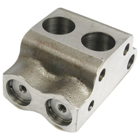 The Sparex Valve Chamber (Part No. S.40848) is a metallic mechanical component featuring two large holes on the top and two threaded holes at the bottom, specifically designed for use in MKIII Pumps. Its rugged surface and rectangular shape make it a crucial element in various Valve Kit assemblies.