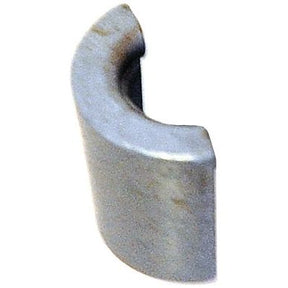 A polished, metallic object with a smooth surface, resembling a curved half-cylinder shape and reminiscent of high-quality tractor parts like the Valve Collet (Pair) from Sparex Part No. S.41412 by Sparex.