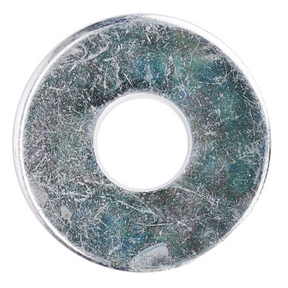 A detailed view of a weathered AGCO Fendt washer (X454407508000) with visible scratches and tarnish, resembling parts from a Fendt Vario SCR, featuring a central hole.