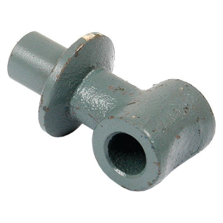 The Yoke (Sparex Part No. S.43761) is a metal component from Sparex featuring a cylindrical base, a flat flange in the middle, and a hollow cylindrical extension at one end. It is painted gray and appears slightly worn.
