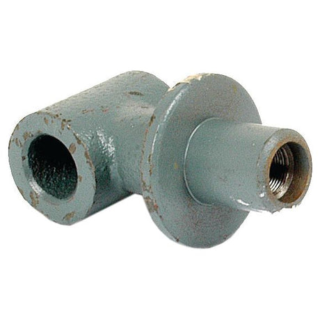 A metal pipe fitting with an L-shaped design and threaded openings in a worn gray-green finish, compatible with Sparex and Massey Ferguson components, specifically the Yoke (Sparex Part No.S.43761) by Sparex.
