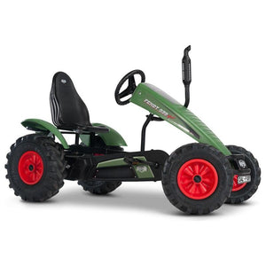 The AGCO Fendt - GOKART FENDT 939 VARIO - X991014134000 is a green pedal go-kart featuring a black seat and steering wheel. It sports large black tires with red hubs and is adorned with a FENDT 939 Vario decal, making it perfect for young adventurers.