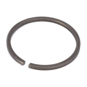 The AGCO Massey Ferguson - Circlip - 3785579M1 is a metallic circlip with a small gap, commonly used to secure components onto shafts or within housings, and is often found in Massey Ferguson tractor models for both 2WD and 4WD configurations.