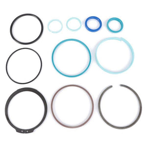 An assortment of authentic seals and gaskets from AGCO's Massey Ferguson Double Acting Hydraulic Cylinder Seal Kit (G001990011420), available in a variety of sizes and colors to meet high-performance requirements, displayed in a grid pattern on a white background.