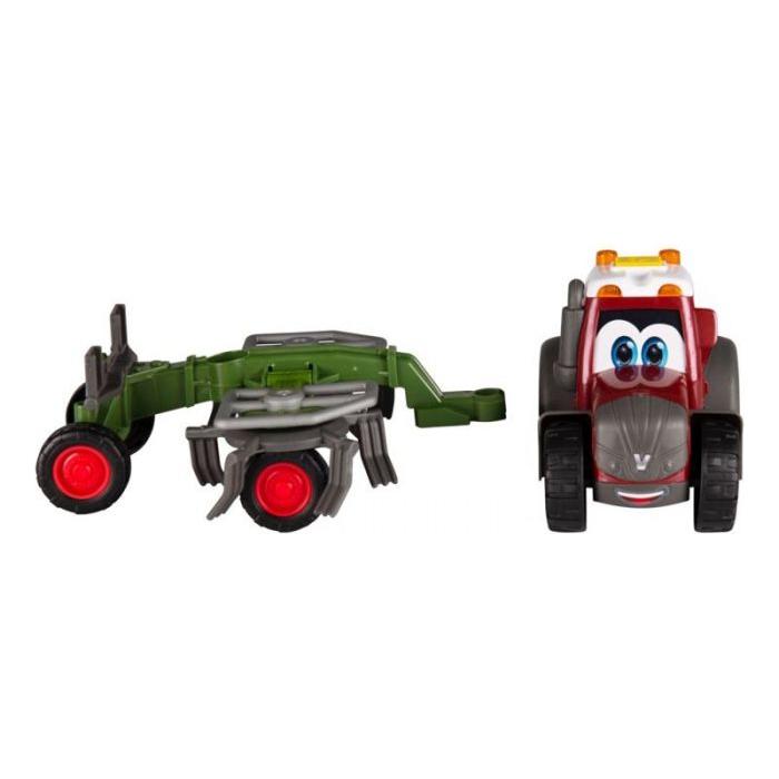 Two toy vehicles from Dickie Toys: a green plow with red wheels and the Valtra Toy Tractor with Tedder by AGCO, featuring a grey body, a smiling face, large eyes, and an exciting sound and light function.