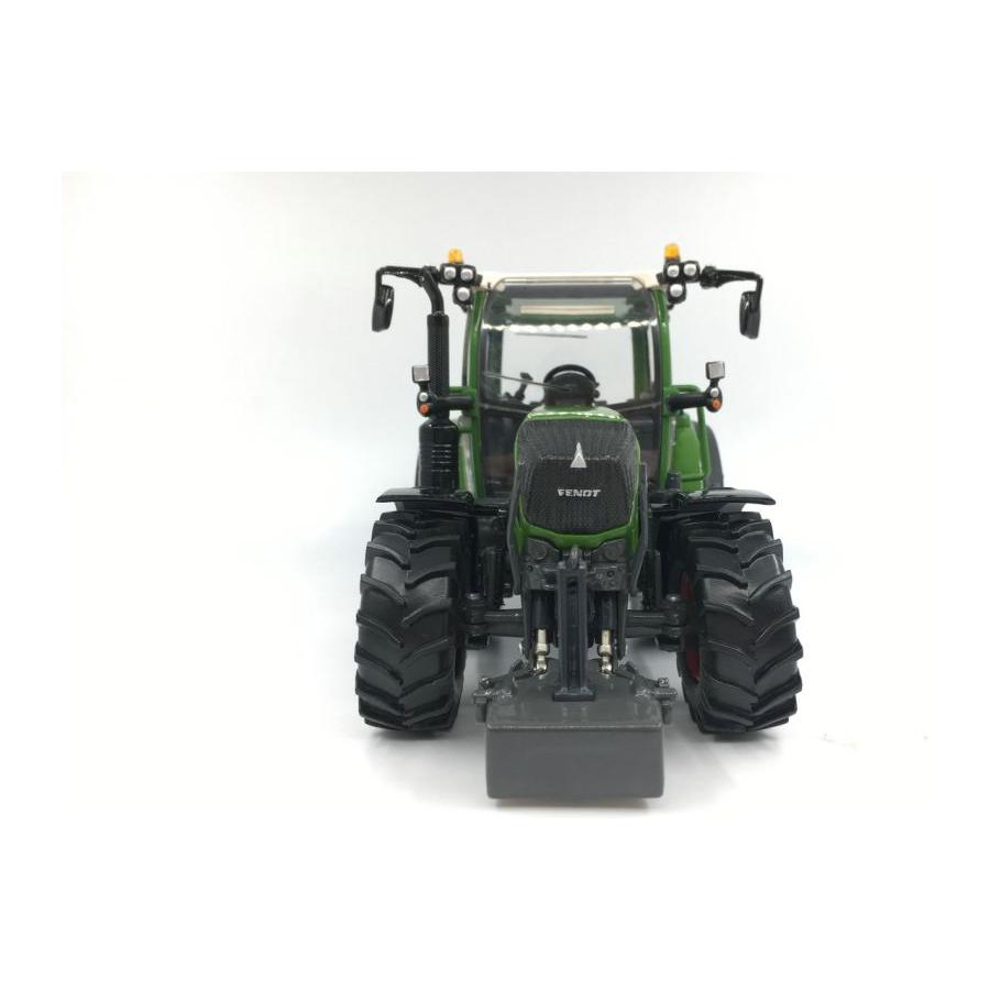 Front view of a green Fendt 313 Vario tractor with large black tires and a front weight attachment on a white background, showcasing the detailed model by AGCO – Fendt - Fendt 313 Vario - USK - X991019005000.