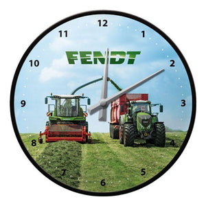 Introducing the Fendt Wall Clock (X991020239000) by AGCO: A designer piece featuring an image of two tractors in a field with the "Fendt" brand name above them. This clock is designed with a black rim, white hour numbers, and two gray clock hands, all powered by reliable quartz clockwork.