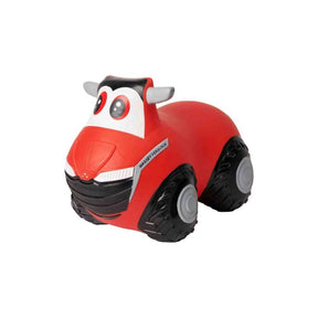 The AGCO Massey Ferguson - BOUNCING TRACTOR - X993502201000 is a red toy tractor featuring large black wheels and a smiling face design on the front, inspired by the iconic Massey Ferguson models. It's perfect for developing motor skills in young children.